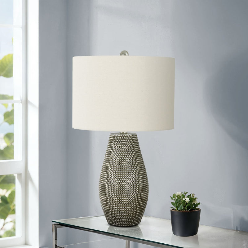 Contemporary gray resin table lamp by 8th Street with a sleek design, perfect for modern living spaces.