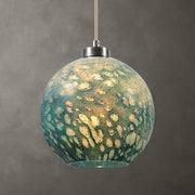 Uttermost Gemblue 1 Light Mini Pendant in blue glass with sleek modern design, hanging from a black cord.