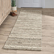 Colorful indoor/outdoor rug from Classic Home Fallon collection with geometric pattern, suitable for patio or living room.
