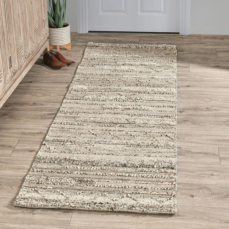 Colorful indoor/outdoor rug from Classic Home Fallon collection with geometric pattern, suitable for patio or living room.