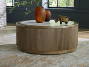 Camdill - Round Cocktail Table - Light Brown / White - R&R Furniture Gallery (Fountain Valley, CA)