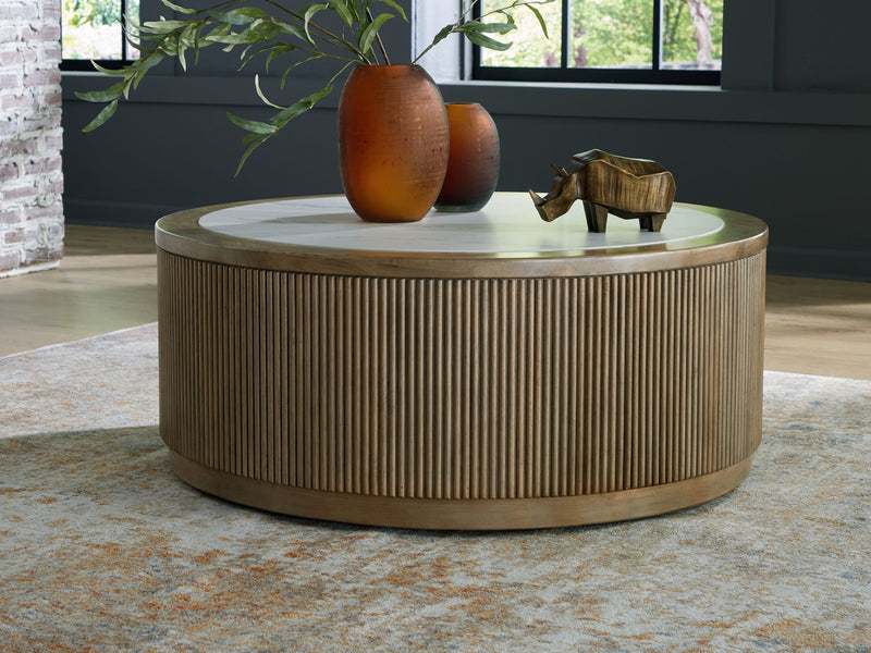 Camdill - Round Cocktail Table - Light Brown / White - R&R Furniture Gallery (Fountain Valley, CA)