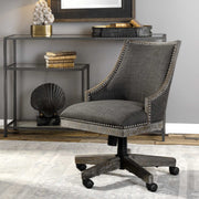 Aidrian charcoal desk chair by Uttermost featuring a modern design with a cushioned seat and backrest on sleek metal legs.