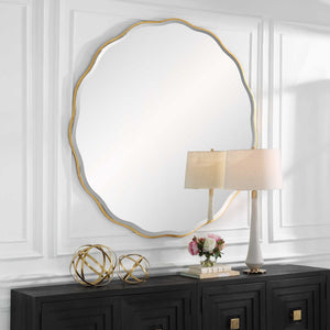 Uttermost Aneta round wall mirror with a sleek frame, designed for modern wall decor.