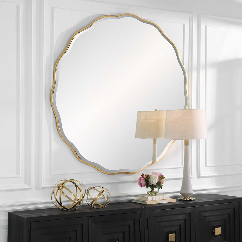 Uttermost Aneta round wall mirror with a sleek frame, designed for modern wall decor.