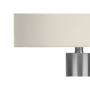 Contemporary 8th Street table lamp with sleek design and neutral-colored shade, perfect for modern home lighting.