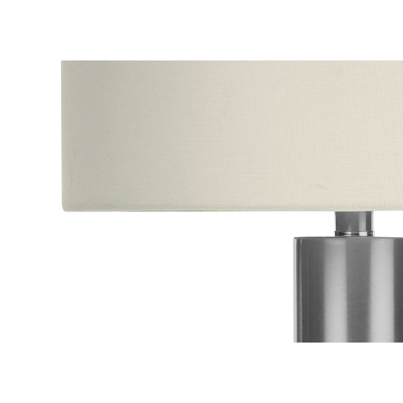 Contemporary 8th Street table lamp with sleek design and neutral-colored shade, perfect for modern home lighting.