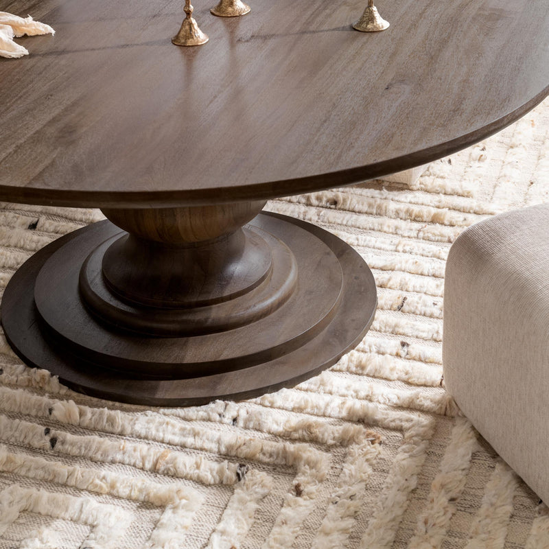 Classic Home Hera round dining table with smooth wooden surface and sturdy legs, ideal for modern dining rooms.
