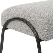 Gray upholstered Jacobsen modern bench by Uttermost with sleek, contemporary design and cushioned seating.