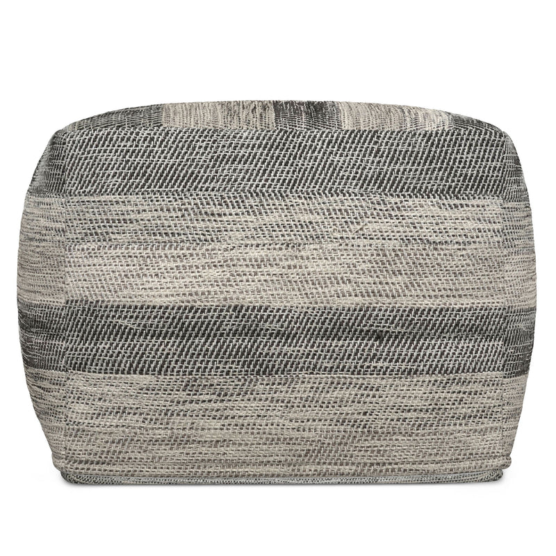 Upholstered square clay-colored accent pouf by Simpli-Home, showcasing its soft fabric and modern design for versatile seating.