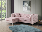 Glory Furniture Paige stationary sectional sofa with chaise, featuring plush cushions and modern design in a living room setting.