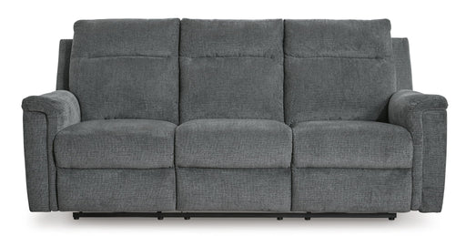 Signature Design by Ashley Barnsana Power Reclining Sofa with plush cushions and reclining features in a modern living room setting.