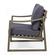 Noble House Samwell outdoor 2-piece set with coffee table and loveseat, featuring wicker frames and cushioned seating.
