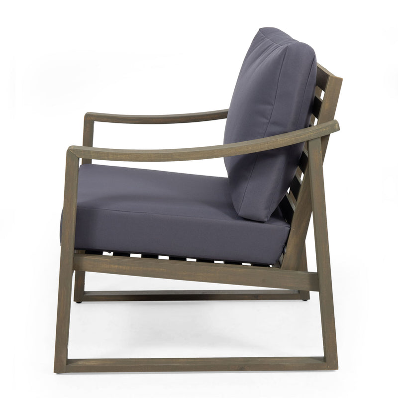 Noble House Samwell outdoor 2-piece set with coffee table and loveseat, featuring wicker frames and cushioned seating.