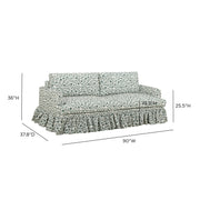 Gertrude TOV Furniture linen weave floral sofa with plush cushions, showcasing a stationary sofa with a floral pattern and modern style.