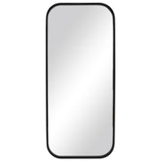 Uttermost Concord tall iron wall mirror in black with a sleek, modern frame reflecting a contemporary interior.