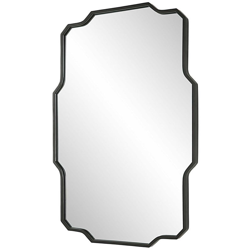 Black Casmus Iron Wall Mirror by Uttermost featuring a sleek circular design mounted on a wall.