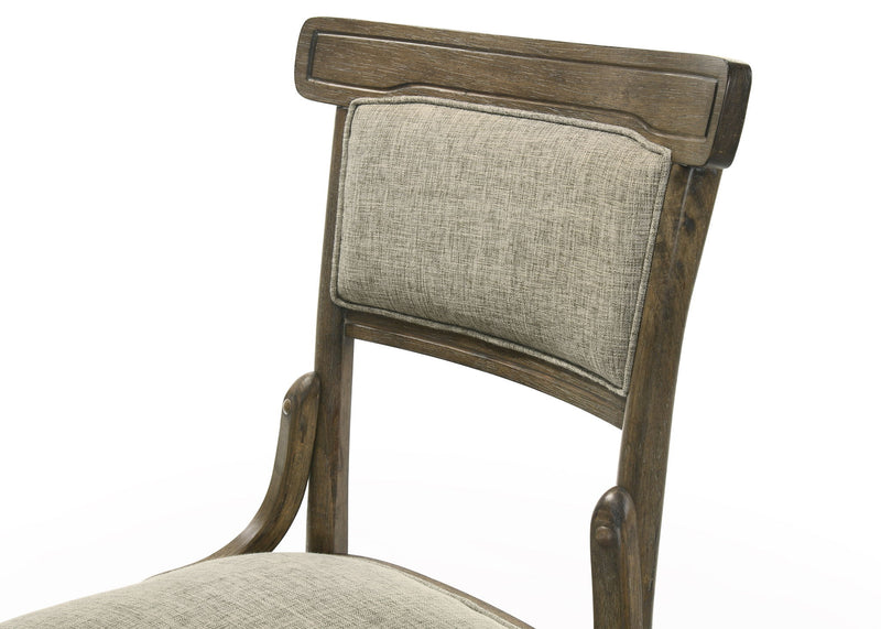 Set of two Lilola Home Bistro wide dining chairs with cushions in vintage walnut finish, showcasing sturdy wooden frames and comfortable seating.
