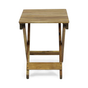 Outdoor folding wooden side table by Noble House, showing a compact, natural wood finish with foldable design for outdoor use.