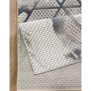 Geometrix - 5'3" X 7'3" Area Rug & Geometric, 3D Effect - Ivory / Gray - R&R Furniture Gallery (Fountain Valley, CA)