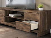 Signature Design by Ashley Zadilyn TV stand with built-in fireplace option, modern wood finish, and storage cabinets.