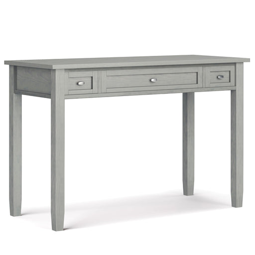 Handcrafted Warm Shaker writing desk by Simpli-Home with a natural wood finish and clean design, featuring a spacious surface and storage drawers.