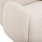 TOV Furniture Marius accent arm chair with beige upholstery and wooden legs, showcasing a stylish and comfortable design.