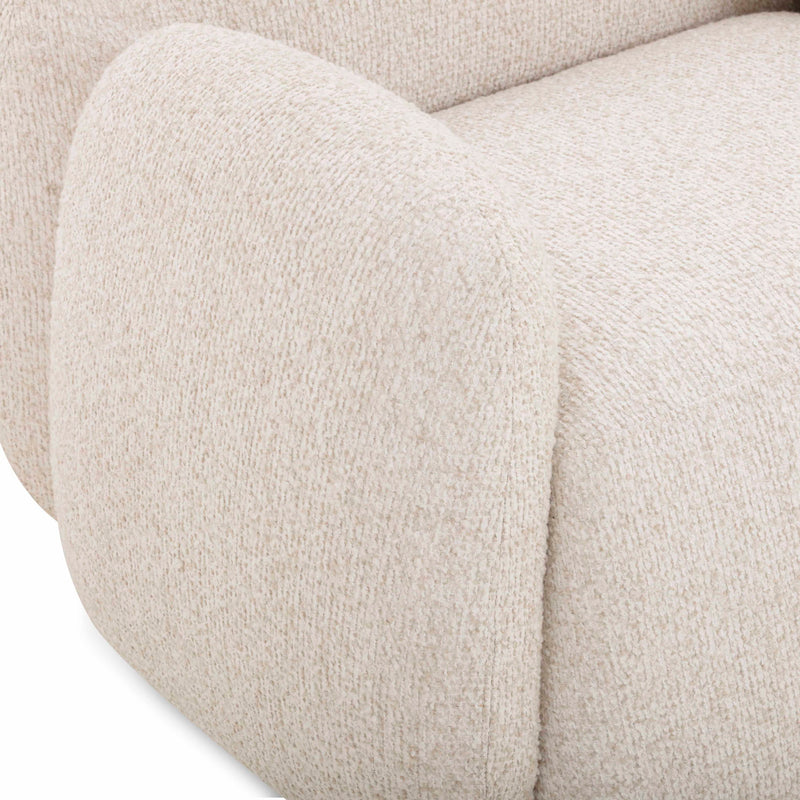 TOV Furniture Marius accent arm chair with beige upholstery and wooden legs, showcasing a stylish and comfortable design.