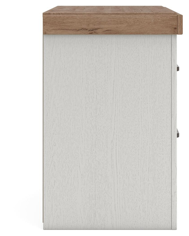 White and brown two-drawer nightstand by Benchcraft with built-in charging station, featuring a sleek modern design.