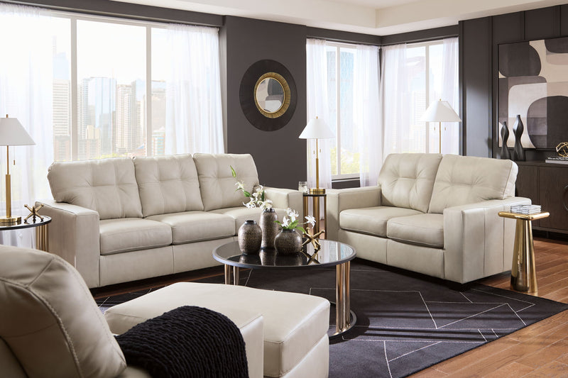 Signature Design by Ashley Santorine living room set with stationary chair and matching ottoman in stylish upholstery.