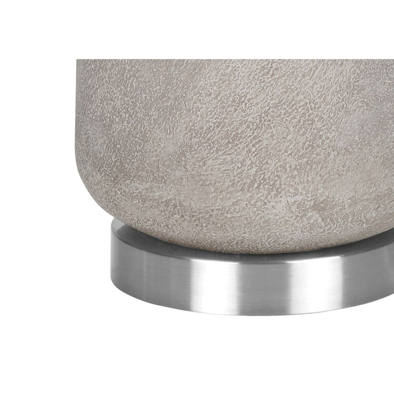 Modern gray resin table lamp by 8th Street, featuring a sleek design perfect for contemporary home lighting.