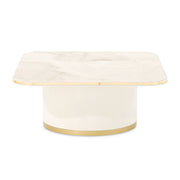 Michael Amini Gineverra rectangular cocktail table with a sleek glass top and elegant wooden frame.