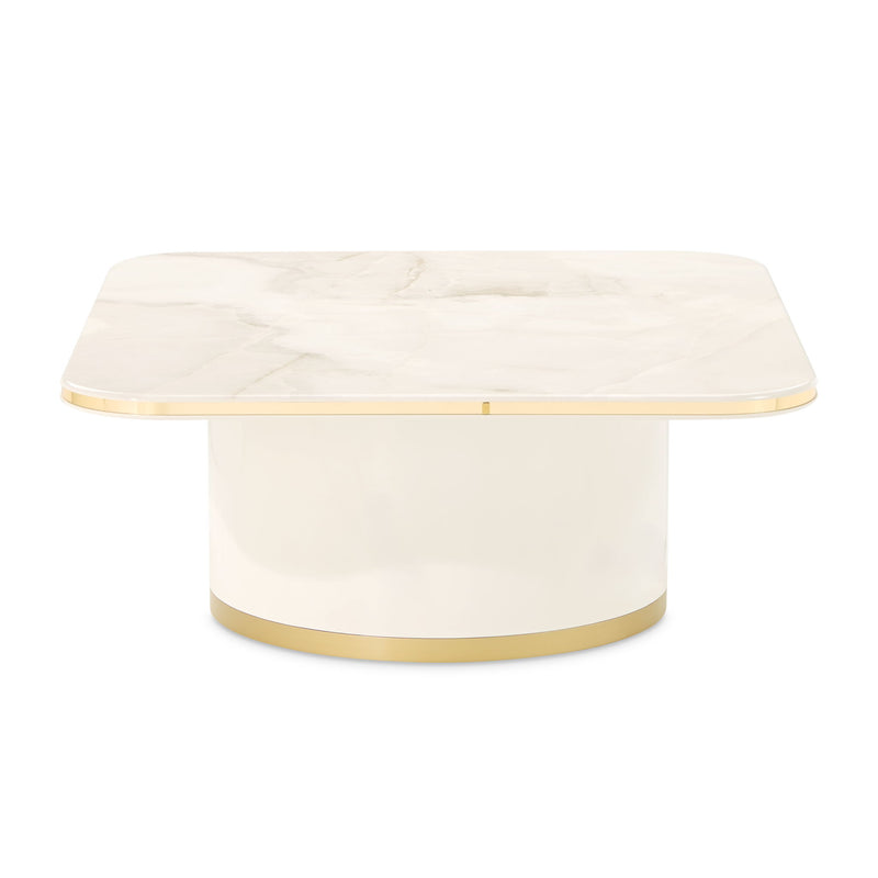 Michael Amini Gineverra rectangular cocktail table with a sleek glass top and elegant wooden frame.