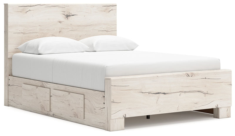 Signature Design by Ashley Lawroy panel bed with built-in storage drawers in a modern bedroom setting.