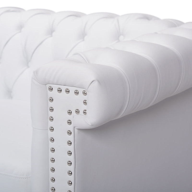 Noble House Chesterfield style 3-seater sofa with deep button tufting and classic stationary design in a luxurious upholstery.