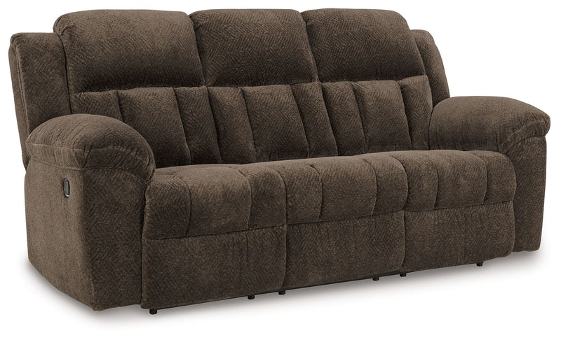Reclining living room set with plush fabric sofas and loveseats from Signature Design by Ashley, featuring padded armrests and built-in recliners.