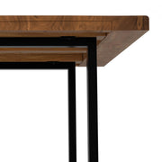 Handcrafted Simpli-Home Fieldcrest dining table with a rustic wooden finish, showcasing a spacious tabletop and sturdy legs.
