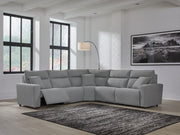Modmax II reclining sectional in salt and pepper fabric by Signature Design by Ashley, showing the plush, modern sectional with reclining seats.