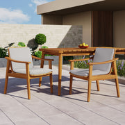 Pair of Noble House outdoor dining chairs in a set of two, featuring weather-resistant design and modern outdoor furniture style.