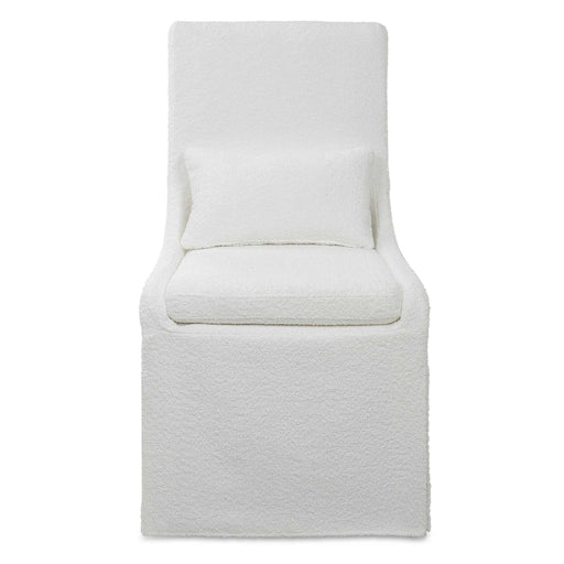 Uttermost Coley armless side chair with plush upholstery and sleek wooden legs, modern design for living or dining spaces.