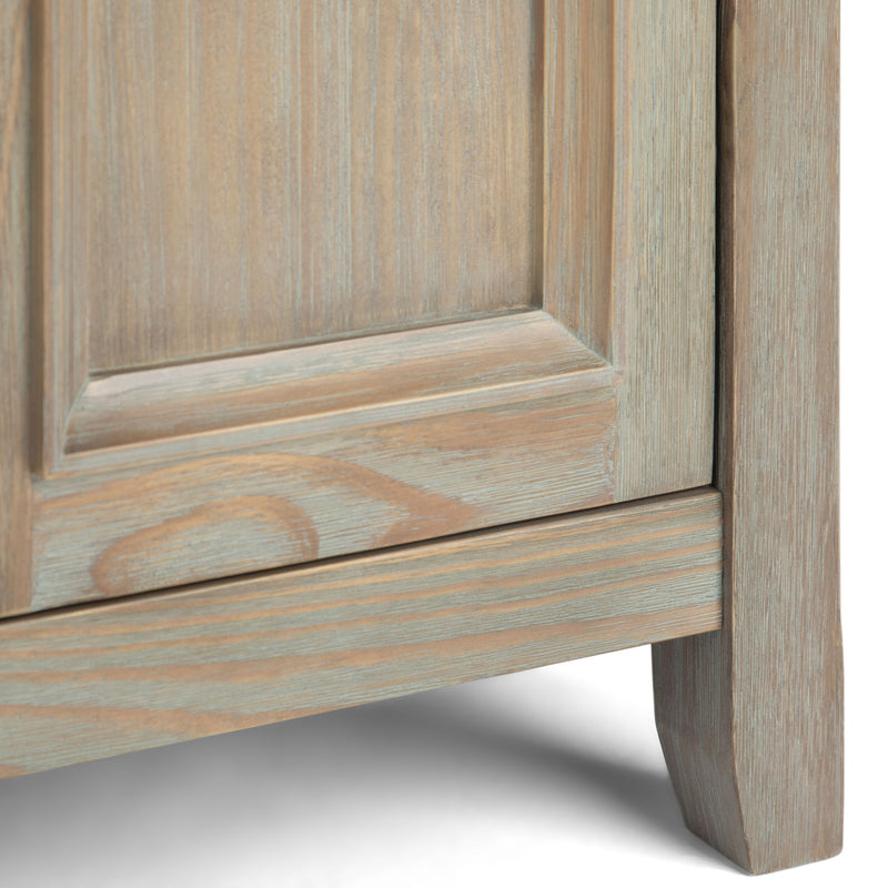 Wide Amherst TV media stand by Simpli-Home with open shelving and storage compartments for modern entertainment setup.