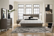 Ashley Arkenton 5-piece bedroom set featuring a bed, nightstands, dresser, and mirror in a stylish bedroom scene.