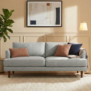 Livingston upholstered stationary sofa by Simpli-Home with plush fabric and cushioned armrests in a modern living room setting.