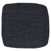 Simpli-Home Fredrik handcrafted square accent pouf with textured fabric, versatile seat or footrest in a cozy living space.