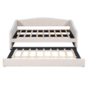 DreamHaus upholstered daybed sofa bed with wood slat, featuring a built-in trundle bed for versatile living space.