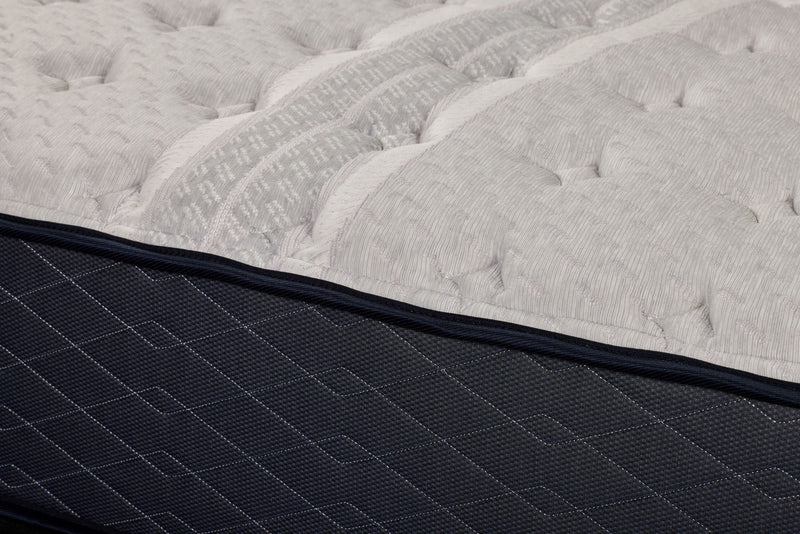 Restonic ComfortCare Hybrid CosmoRest Euro Top mattress with plush fabric cover and layered foam and innerspring construction.