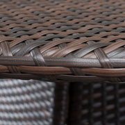 Noble House Corsica round dining table with a brown finish, showcasing smooth surface and sturdy wooden legs.