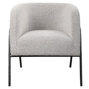 Uttermost Jacobsen accent chair with plush fabric upholstery and sleek wooden legs, stylishly designed for modern living spaces.