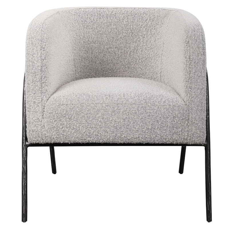 Uttermost Jacobsen accent chair with plush fabric upholstery and sleek wooden legs, stylishly designed for modern living spaces.