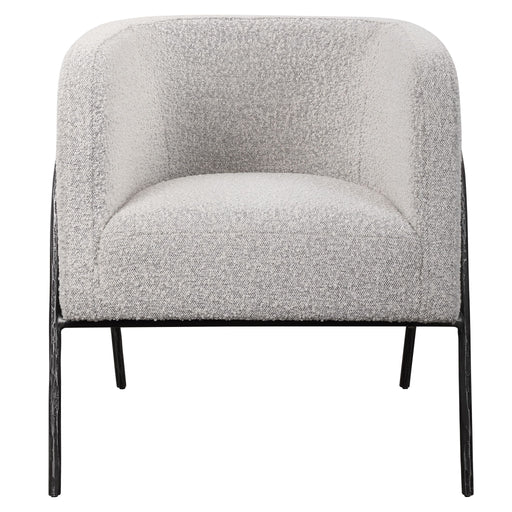 Uttermost Jacobsen accent chair with plush fabric upholstery and sleek wooden legs, stylishly designed for modern living spaces.